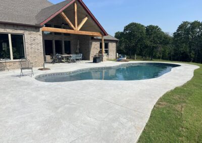 a beautiful pool and patio area designed by crosby pools