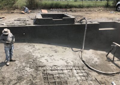 crosby pools lays down the concrete for a square style pool