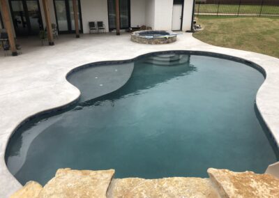 pool, hot tub, and patio area by crosby pools